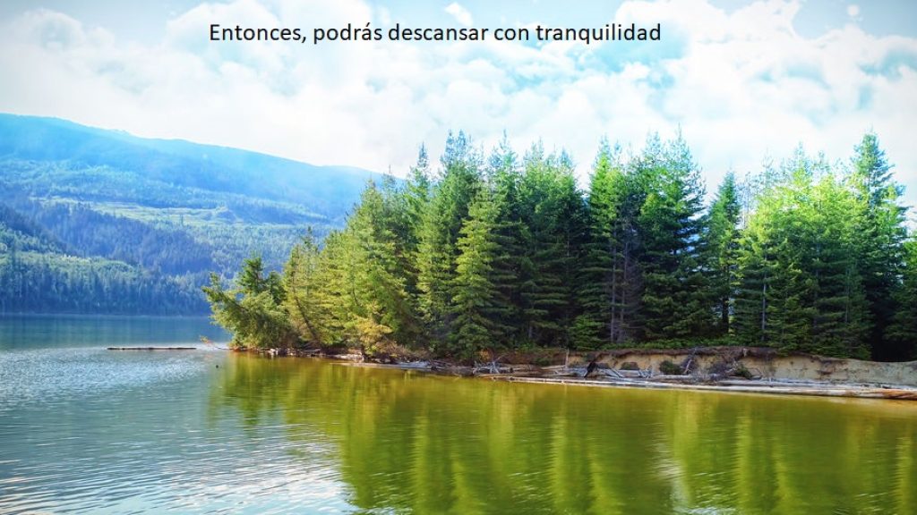 Idyllic shot of river and mountains against sky during sunny day